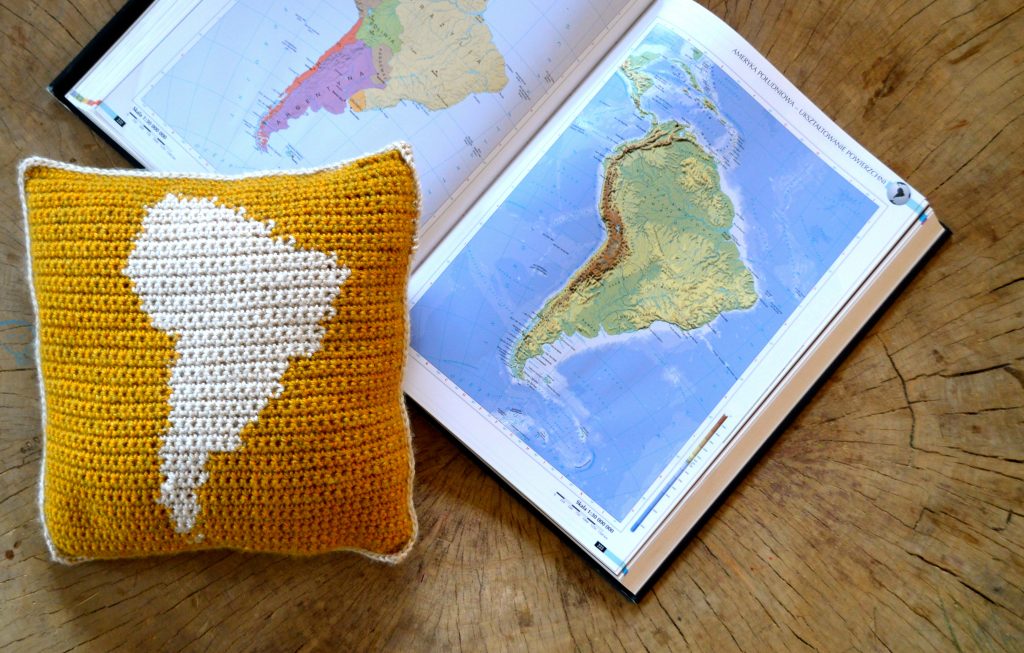 intarsia crochet pillow with map of south america